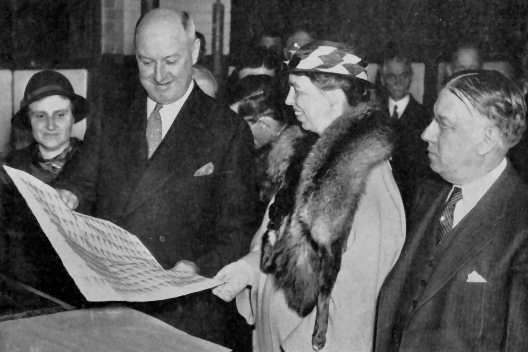 James Farley and Eleanor Roosevelt examining the Mother's Day stamps