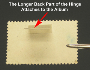 Stamp with small part of hinge attached